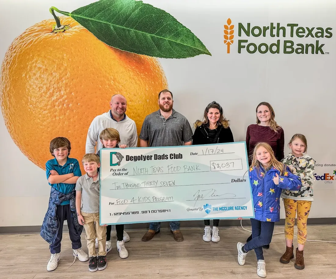 The McClure Agency sponsoring the DeGolyer Dads Club's donation to the North Texas Food Bank
