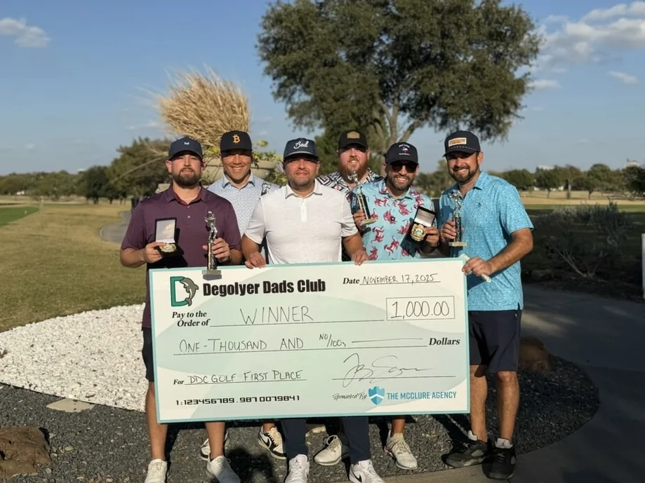 The McClure Agency sponsorship sign at the DeGolyer Dads Club golf tournament